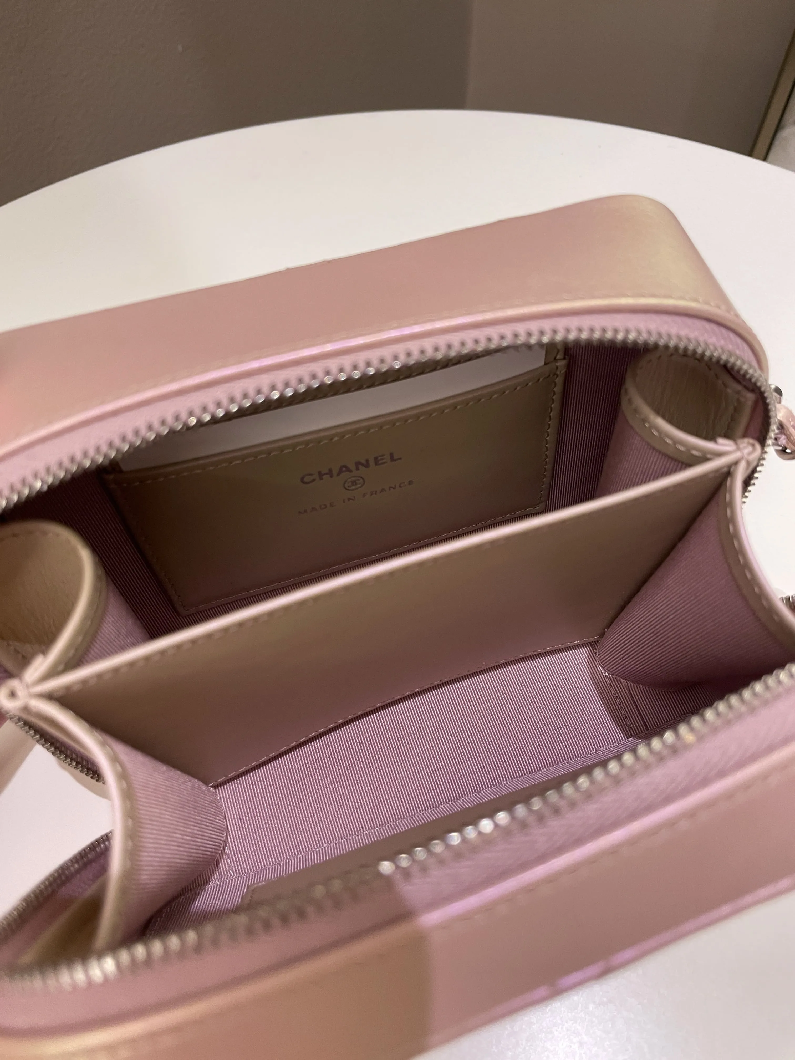 Chanel 21K Quilted Camera Sling Bag Iridescent Pink Calfskin