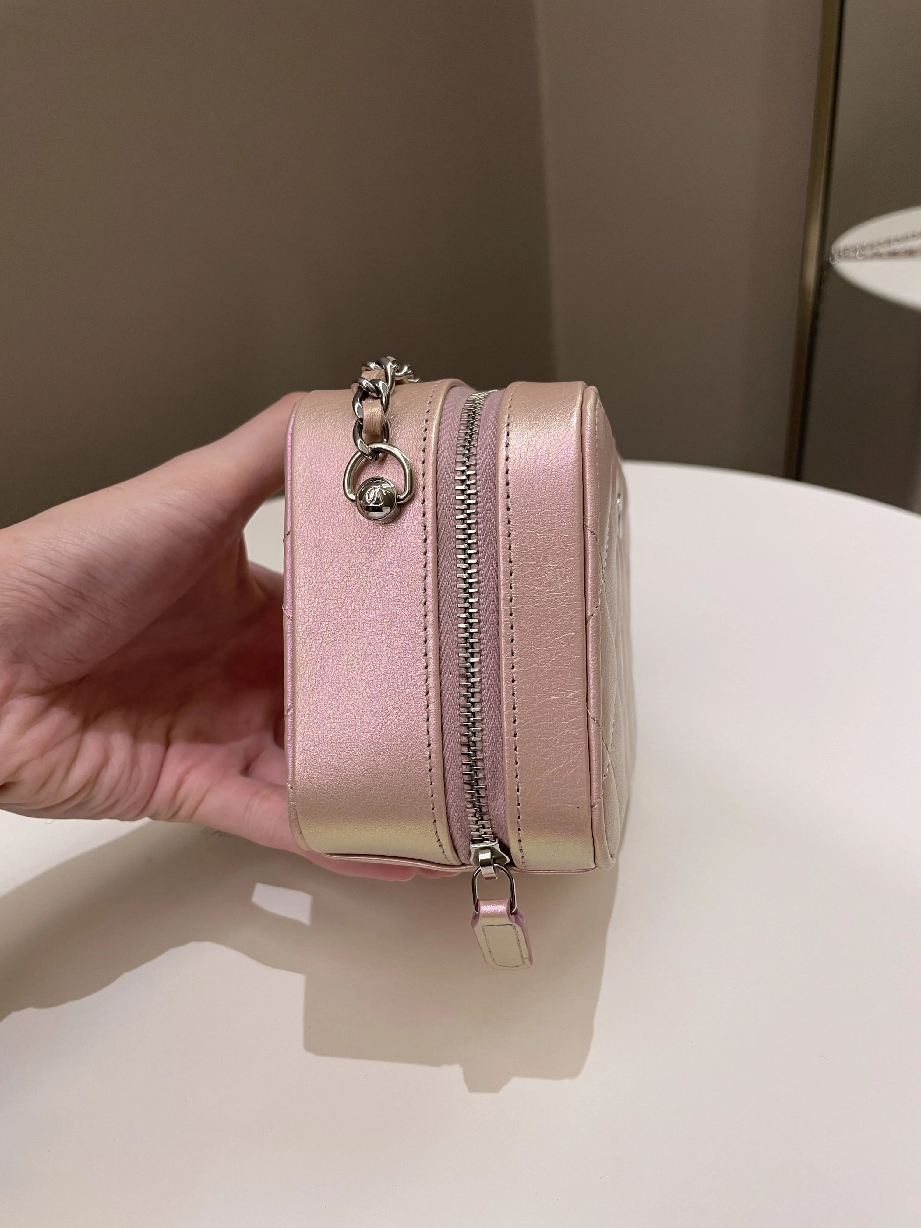 Chanel 21K Quilted Camera Sling Bag Iridescent Pink Calfskin