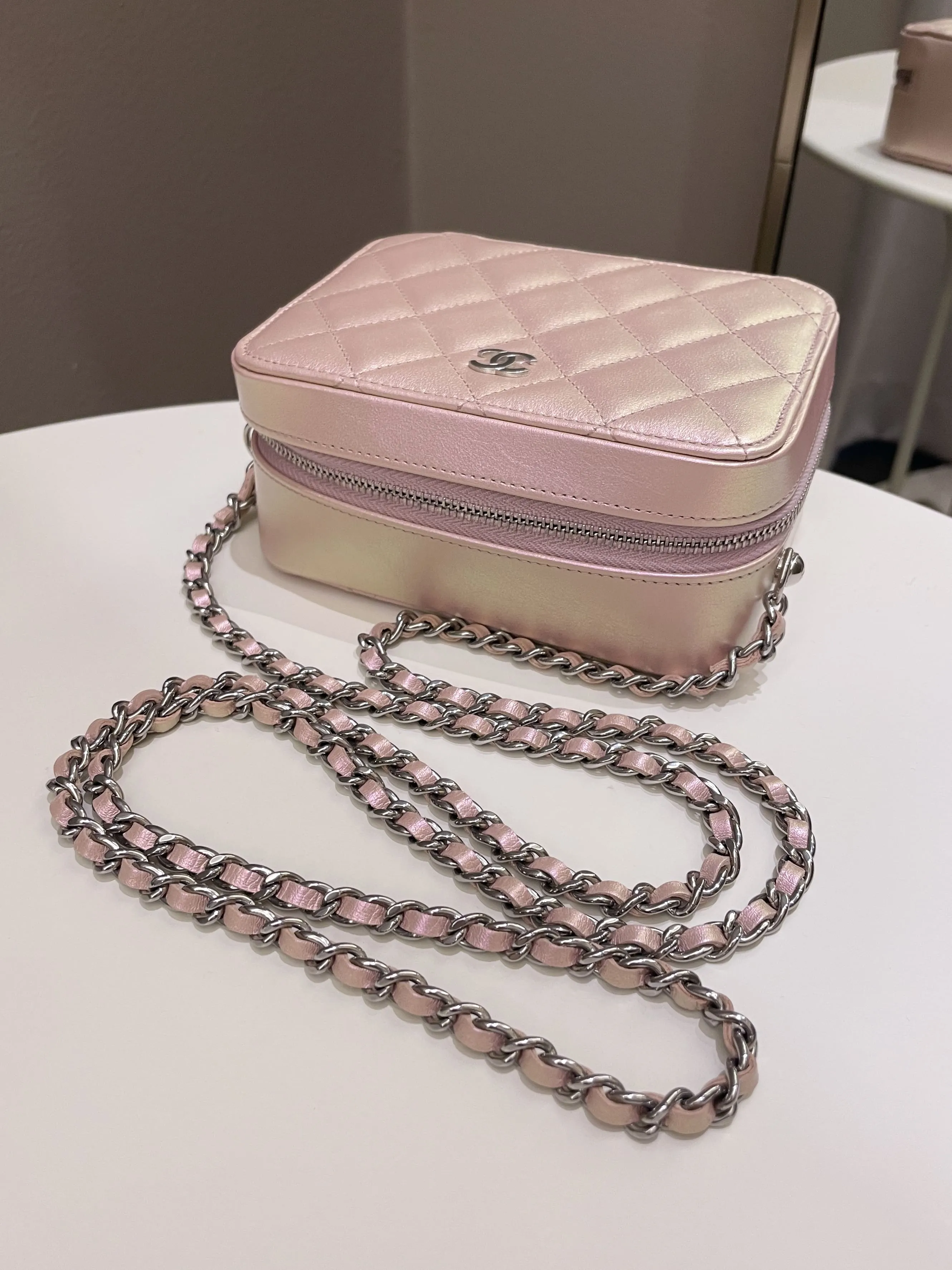 Chanel 21K Quilted Camera Sling Bag Iridescent Pink Calfskin