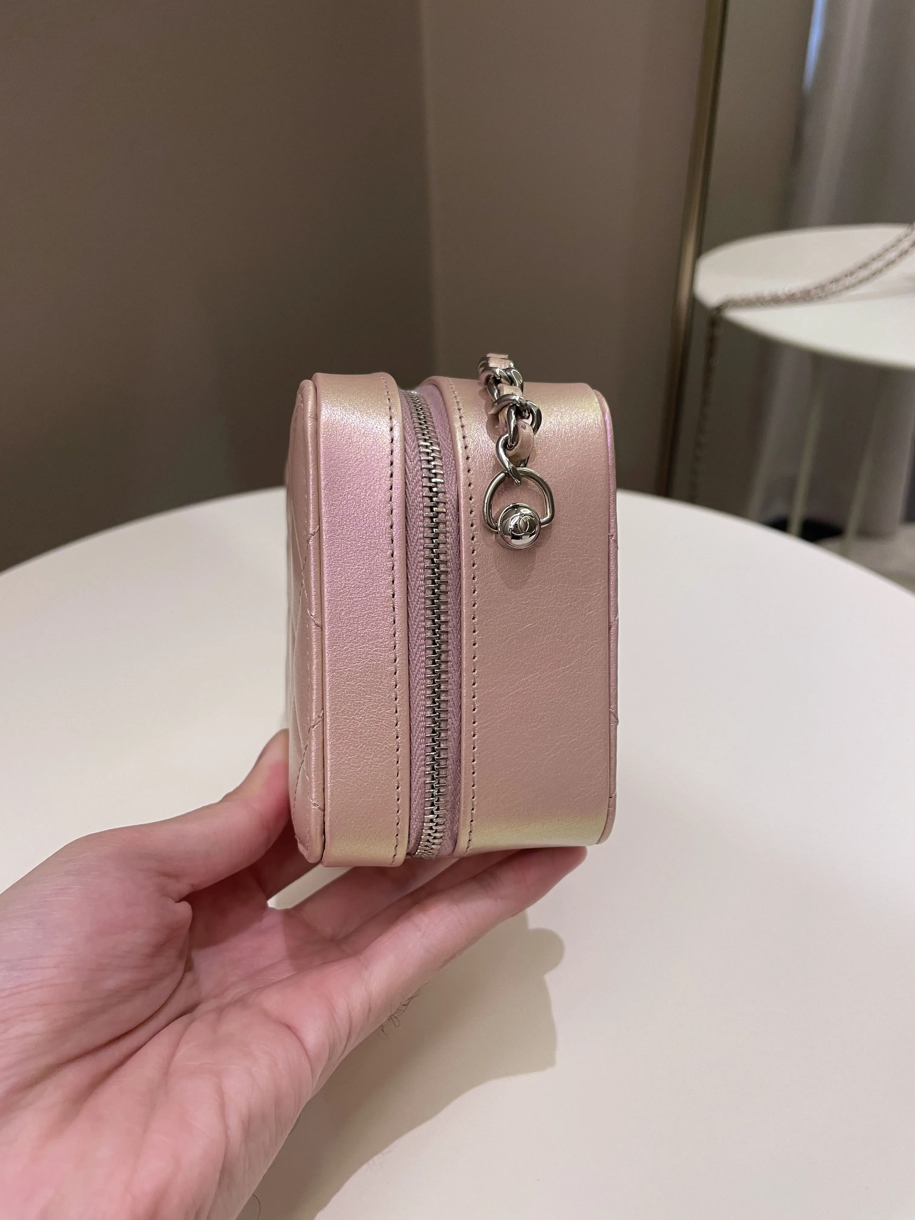 Chanel 21K Quilted Camera Sling Bag Iridescent Pink Calfskin