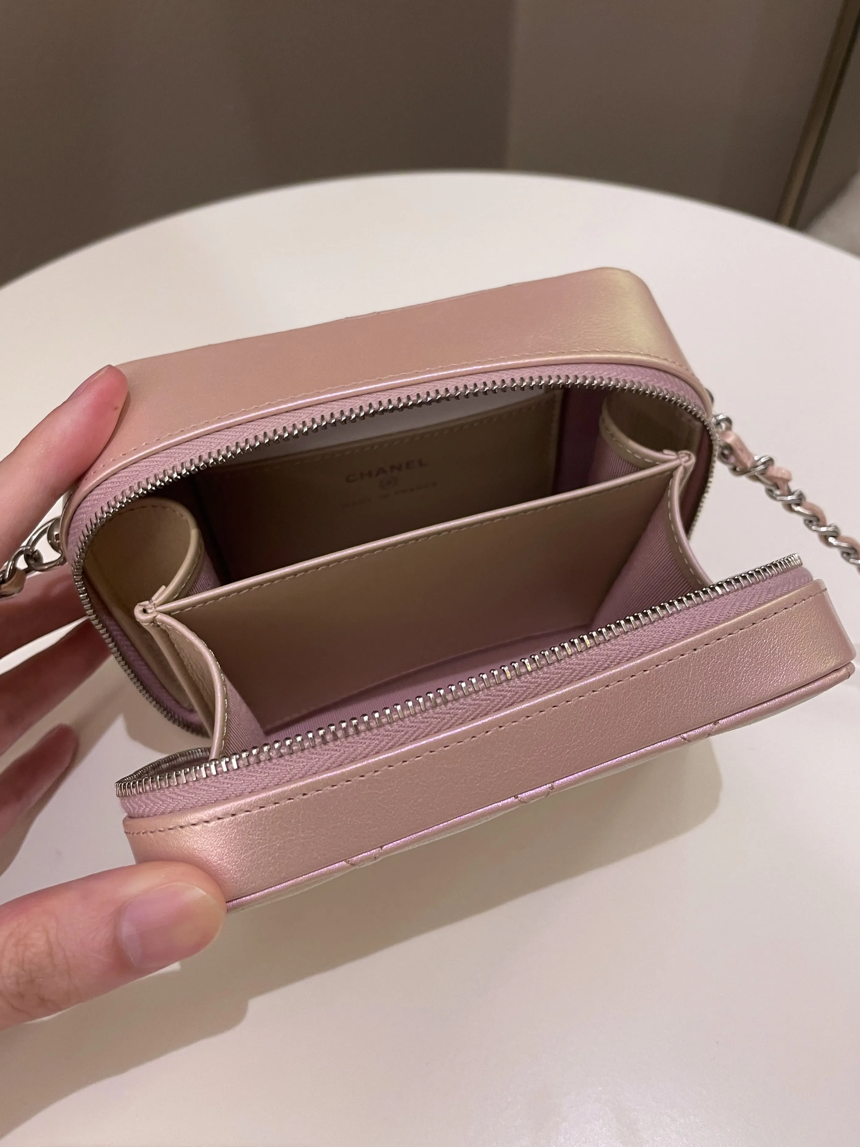 Chanel 21K Quilted Camera Sling Bag Iridescent Pink Calfskin