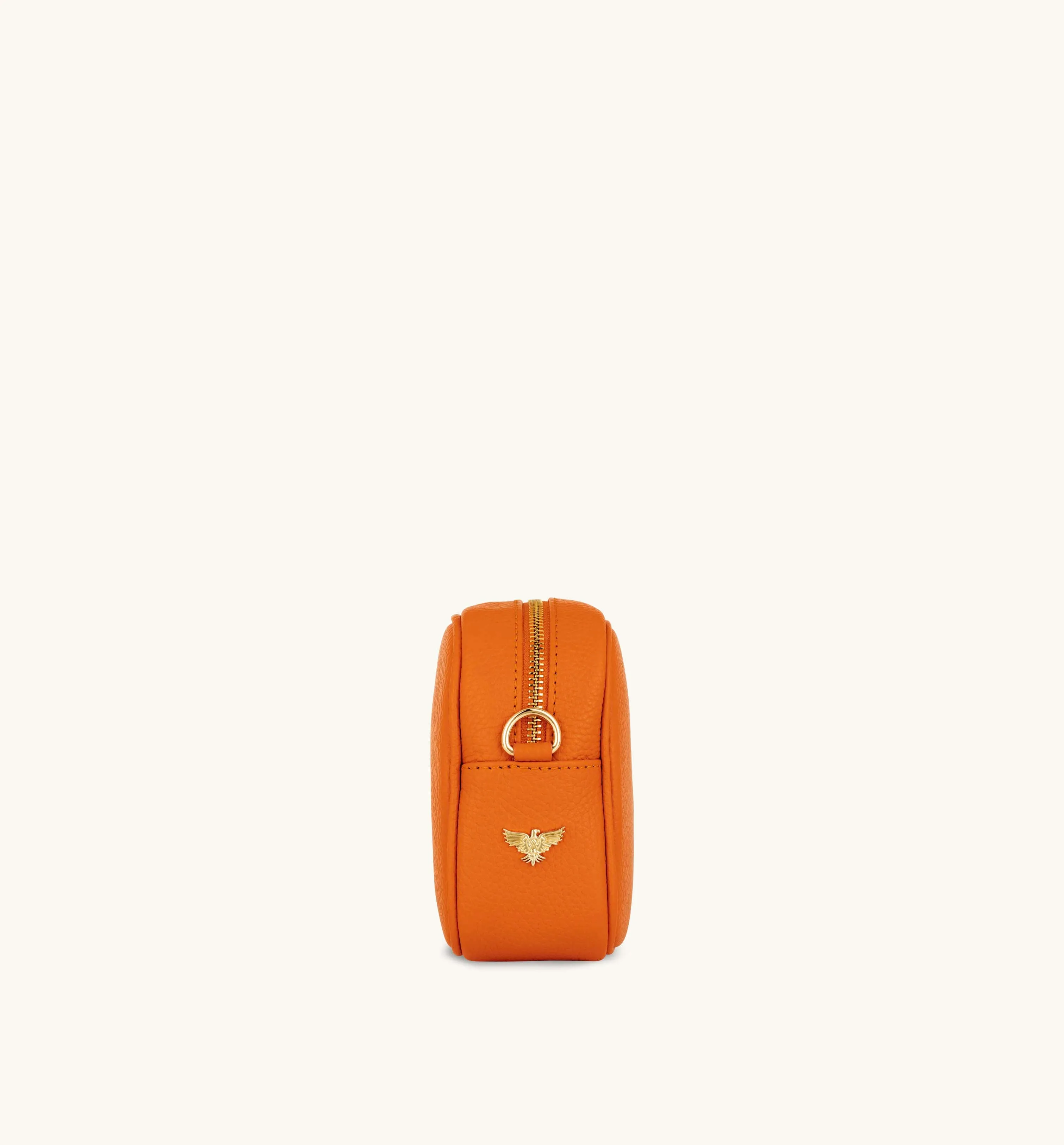 The Tassel Orange Leather Crossbody Bag With Orange Cross-Stitch Strap